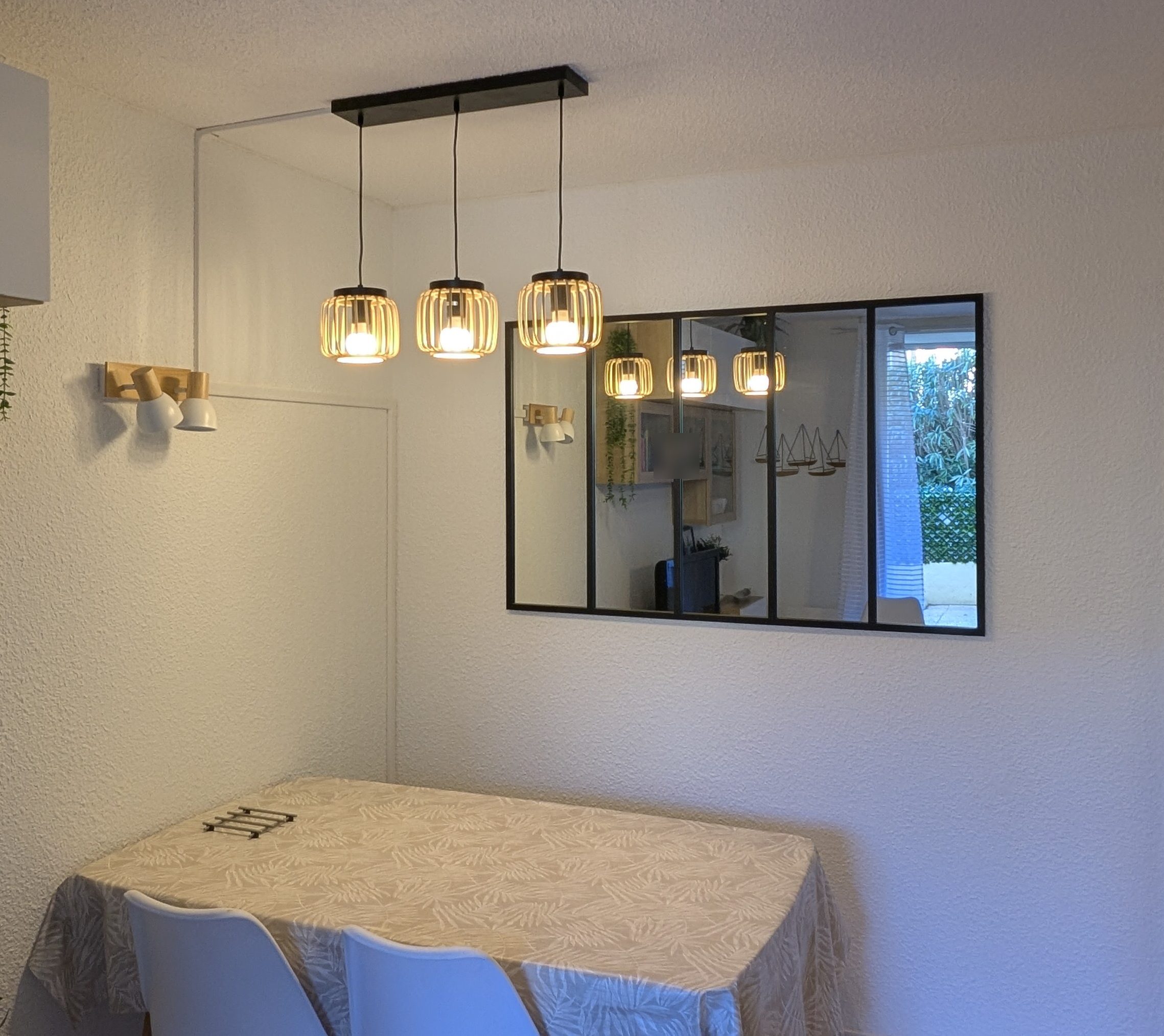 Pose d’une suspension et d’un miroir verrière
